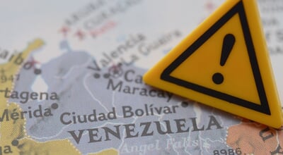 Venezuela,Crisis,Warning,Sign,On,Map,,Travel,Advisory,And