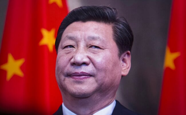 Chinese,President,Xi,Jinping,Smiles,In,Front,Of,The,Chinese