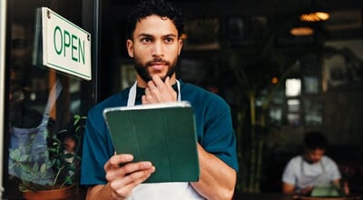 Doorway,,Tablet,And,Thinking,With,Man,In,Coffee,Shop,For