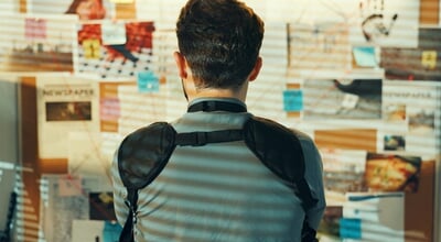 Detective,,Man,Or,Board,With,Evidence,In,Office,For,Investigation,