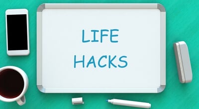 Life,Hacks,,Message,On,Whiteboard,,Smart,Phone,And,Coffee,On