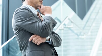 Middle-aged,Asian,Businessman,Thinking,In,Office