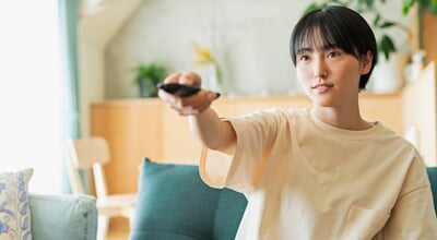 Women,Watching,Tv,In,The,Living,Room