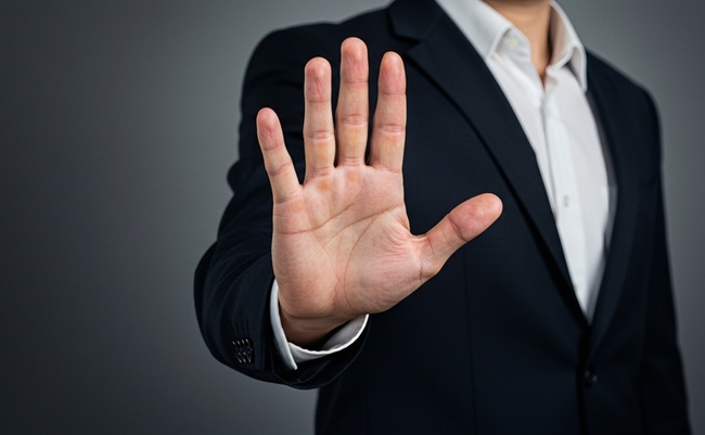 Businessman,Showing,Stop,Hand,Gesture,,Concept,Of,Denial,,Saying,No,