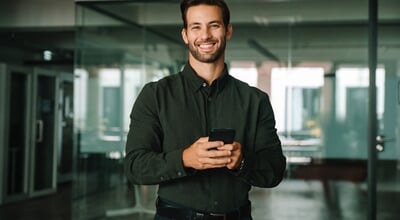 Young,European,Business,Man,Manager,Trader,Using,Cell,Phone,Mobile