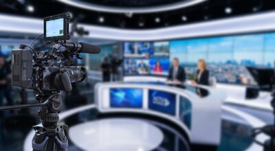 Television,News,Studio,Background,With,Video,Camera,And,Copy,Space