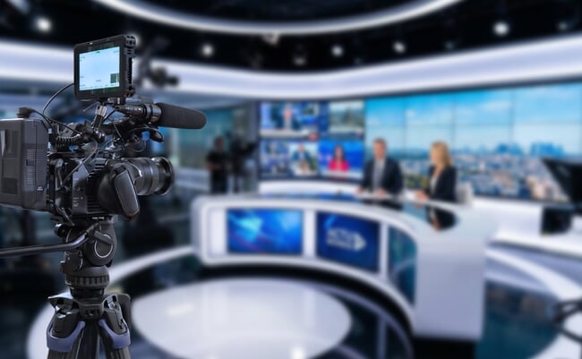 Television,News,Studio,Background,With,Video,Camera,And,Copy,Space