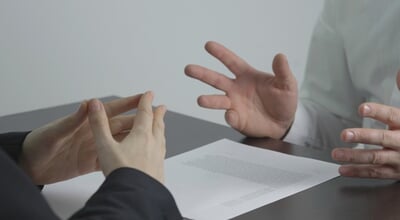 Detail,Of,Hands,At,Desk,,Face,To,Face,At,Negotiation,