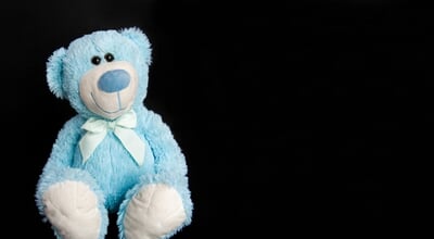 Blue,Teddy,Bear,On,A,Black,Background.,Children's,Toy,teddy,Bear,