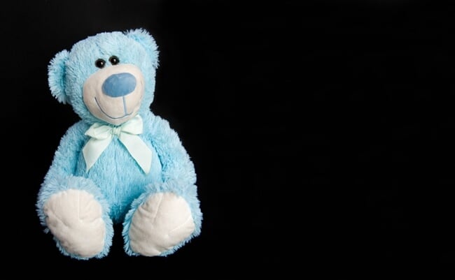 Blue,Teddy,Bear,On,A,Black,Background.,Children's,Toy,teddy,Bear,