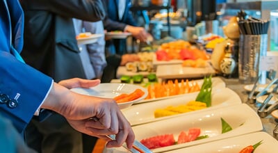 Hand,Of,People,Take,Buffet,Japanese,Food,In,Hotel,Party,