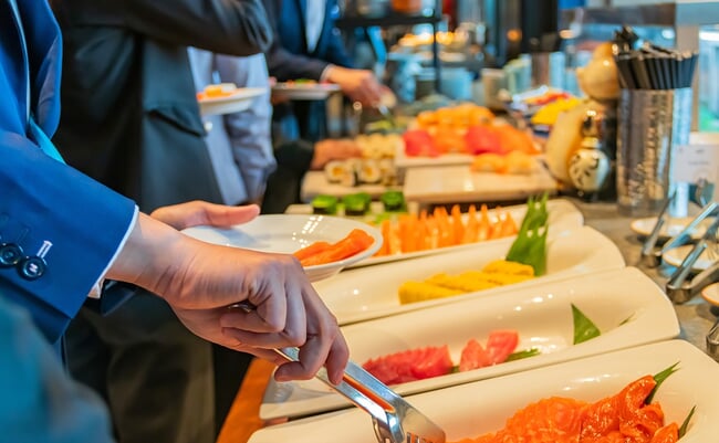 Hand,Of,People,Take,Buffet,Japanese,Food,In,Hotel,Party,
