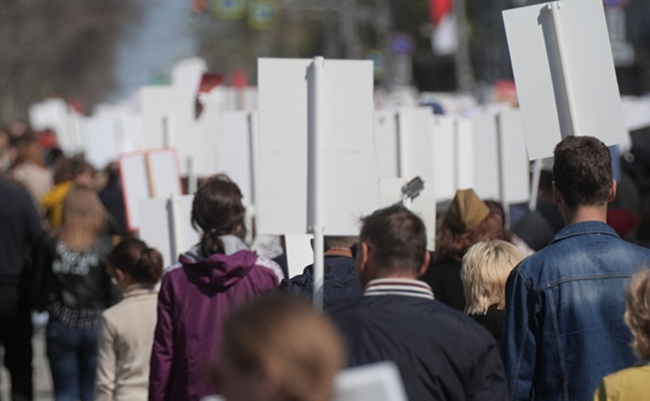 Protester,Crowd,Carry,Propaganda,Banner,Sign.,Demonstration,People,Move,Along