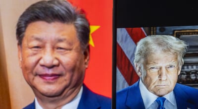 U.s.,President,Donald,Trump,Appears,On,A,Mobile,Screen,,Alongside