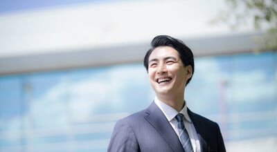 Close-up,Of,A,Young,Male,Office,Worker,Smiling,And,Looking