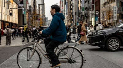 Tokyo,,Japan,-,December,26,,2025:,Man,Riding,A,Bicycle
