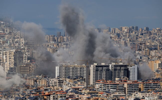 Multiple,Large,Plumes,Of,Thick,Grey,Smoke,Billow,From,Residential