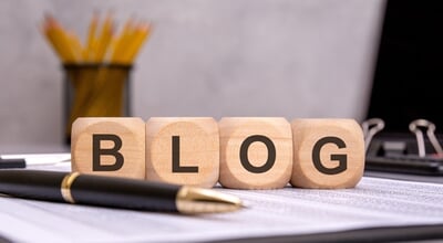 Wooden,Blocks,With,The,Word,Blog,Placed,On,A,Business