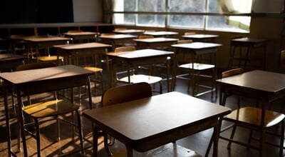 Empty,Japanese,Classroom,With,Wooden,Desks,,Bathed,In,Warm,Sunlight