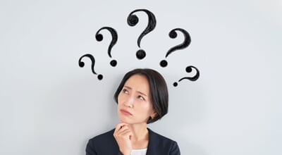 A,Female,Business,Person,Thinking,With,Doubts