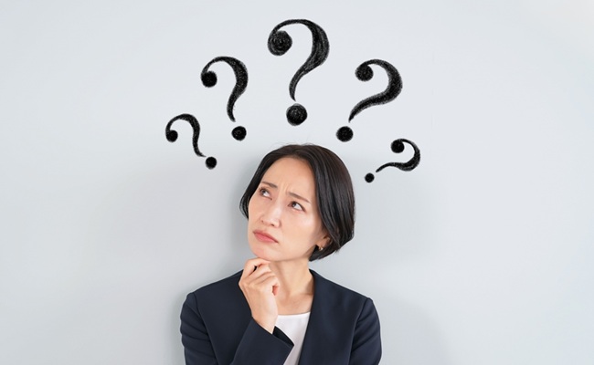 A,Female,Business,Person,Thinking,With,Doubts