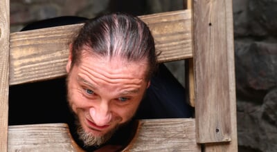 Checiny,,Poland,-,07.25.2025:,A,Man,In,The,Wooden,Stocks