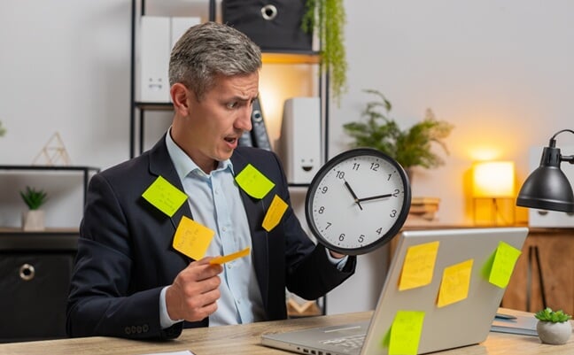 Tired,Exhausted,Fatigue,Young,Businessman,Employee,Manager,In,Suit,Sits
