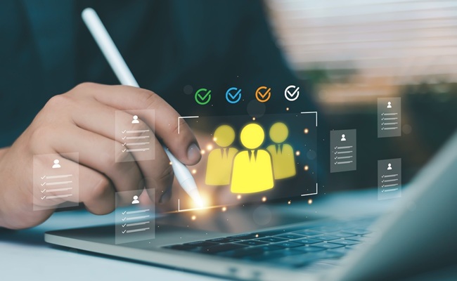 Business,Professional,Selecting,Team,Members,On,Laptop,With,Digital,Checklist