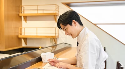 A,Japanese,Chef,Doing,The,Calculations