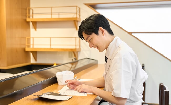 A,Japanese,Chef,Doing,The,Calculations