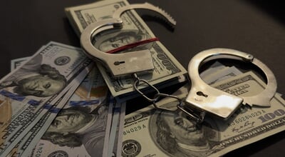 Handcuffs,On,100,Bills,On,Concrete,Floor,For,Crime