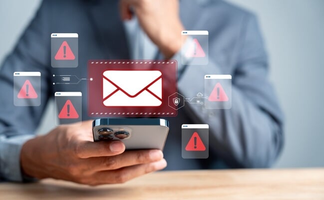 Email,Warning,Danger.,Man,Checking,Smartphone,With,Red,Alert,Email.