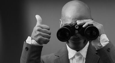 Businessman,Looking,Through,Binoculars,With,White,Background,With,People,Stock