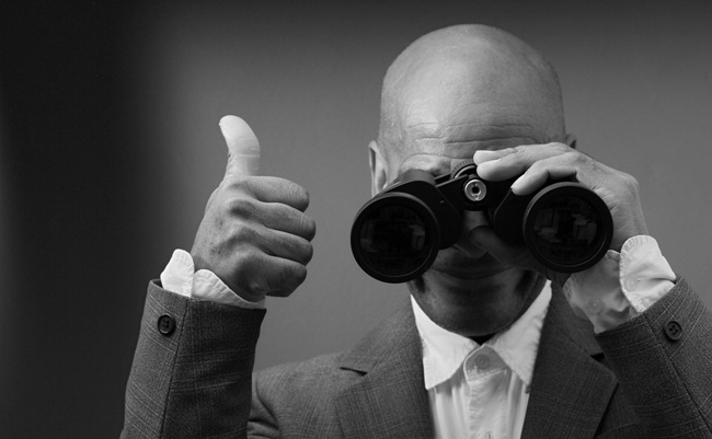 Businessman,Looking,Through,Binoculars,With,White,Background,With,People,Stock