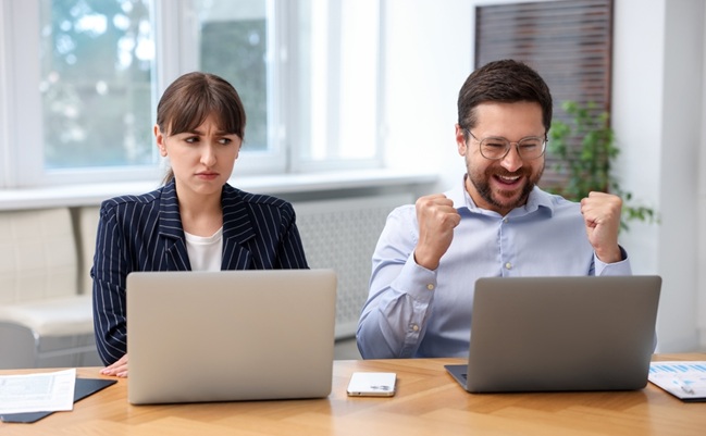 Woman,Feeling,Jealous,Of,Her,Colleague's,Success,In,Office