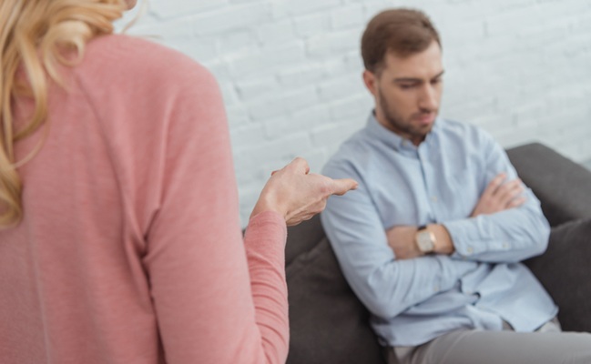 Partial,View,Of,Mother,And,Grown,Son,Having,An,Argument