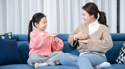 Asian,Mom,And,Daughter,Concept,Communicating,Through,Sign,Language