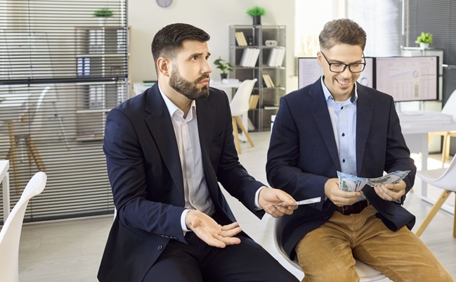 Coworkers,Men,Compare,Wages,In,Office,Payroll,Inequality.,One,Man